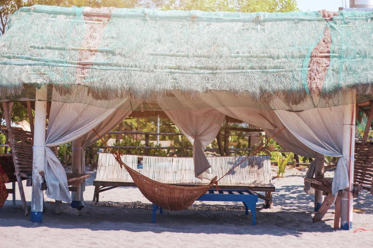Club Monet Beachfront Resort By Cocotel Cabangan Buitenkant foto